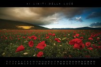 06_Giugno Il geroglifico disegnato dalla luce del tramonto sul fianco del Monte Vettore, simile ad un animale, sembra voler fare da guardiano alla splendida fioritura nel…